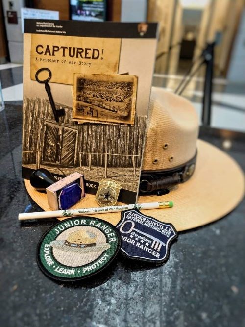 Ranger hat with Junior Ranger book, badge and patch