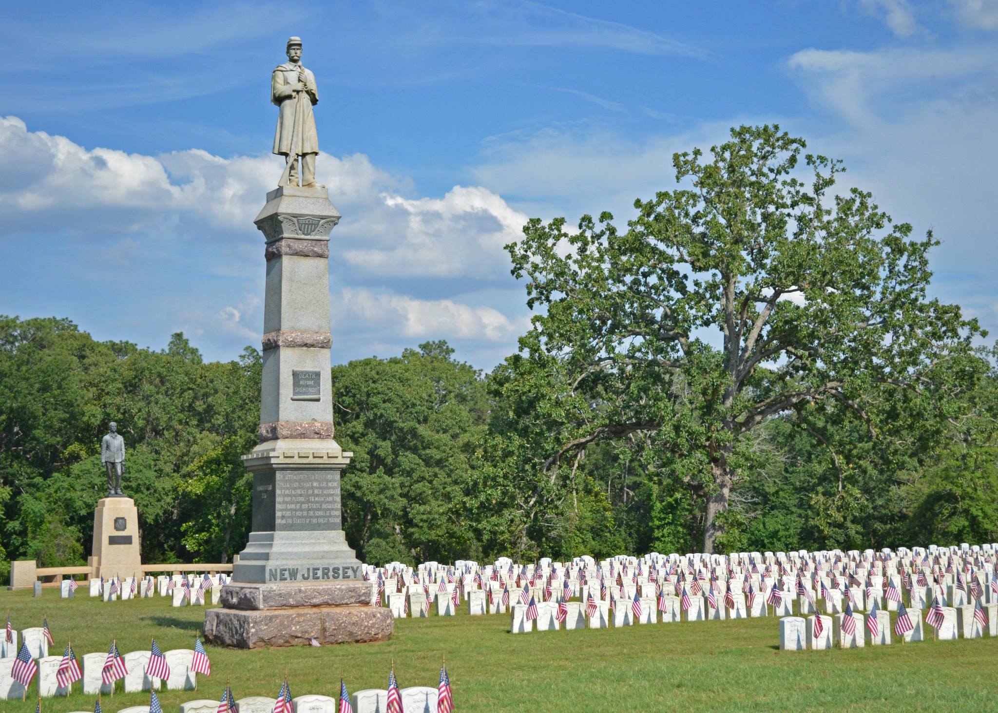 Monuments and graves with American flags