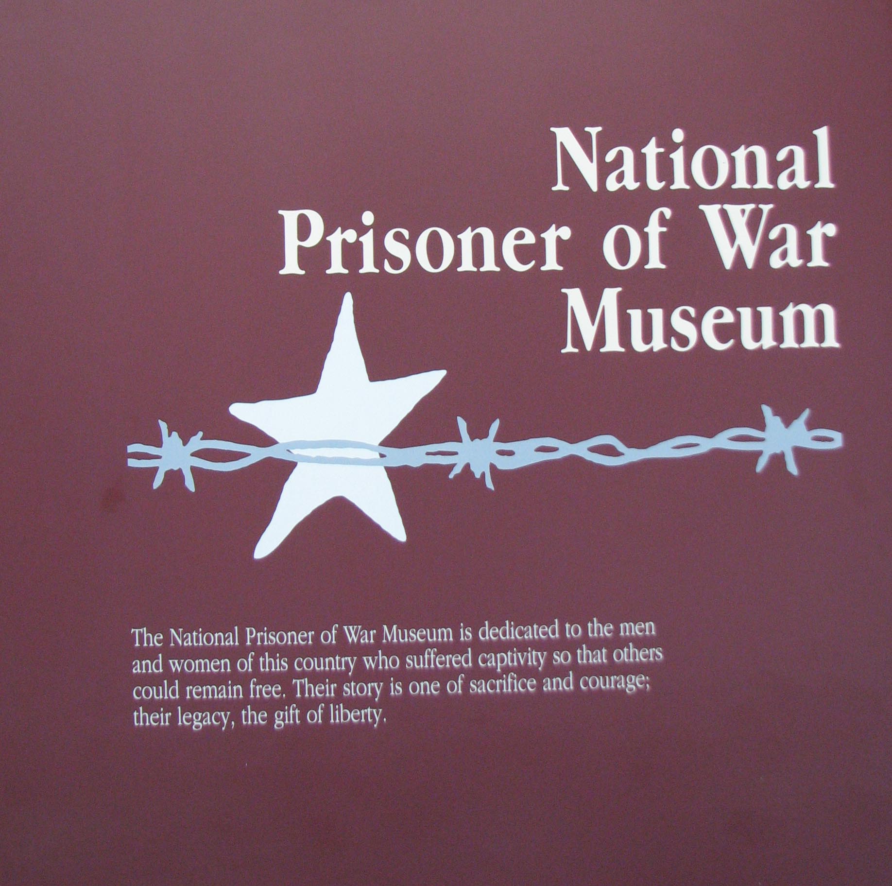 National POW Museum Panel Sign marked with the National Prisoner of War Museum Logo