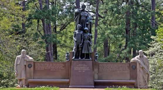 A stone and bronze monument