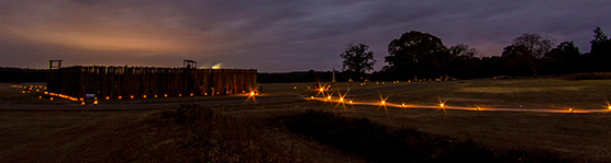 Luminary lights and laterns brighten the landscape of the Andersonville prison