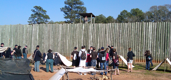 Visitors interact with living historians