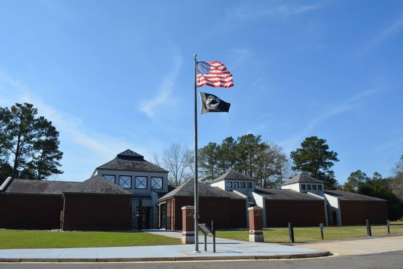 Brick museum with flags in front