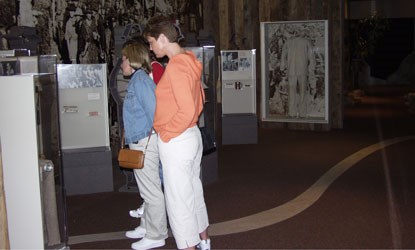 Visitors browse museum exhibits