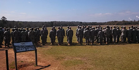 JROTC Cadets stand in uniform on the prison site
