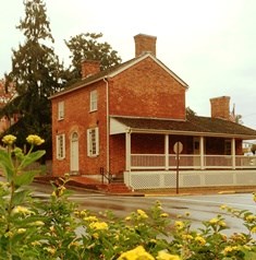 Early Home with yellow flowers