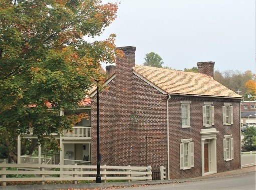 A fall scene of Johnson's Homestead from Main Street