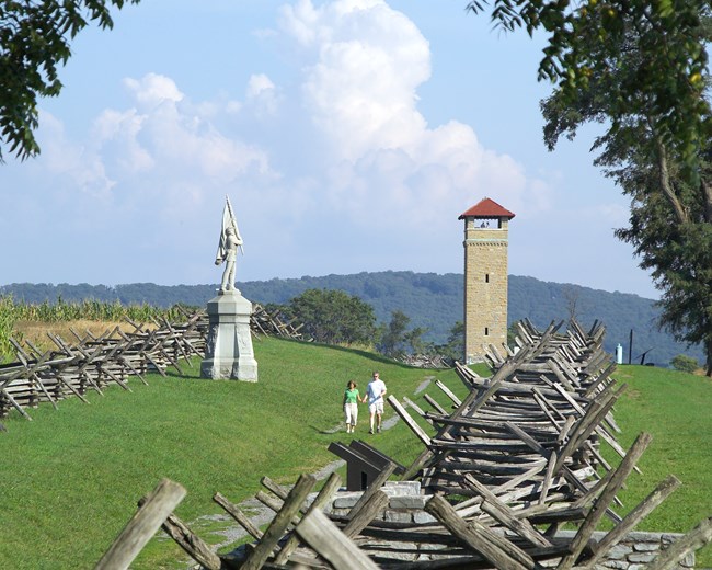 visitors walking in sunken road