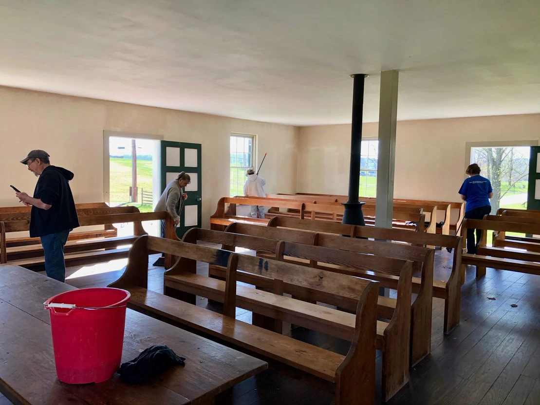 connecticut civil war round table cleaning the dunker church volunteers sweep a building