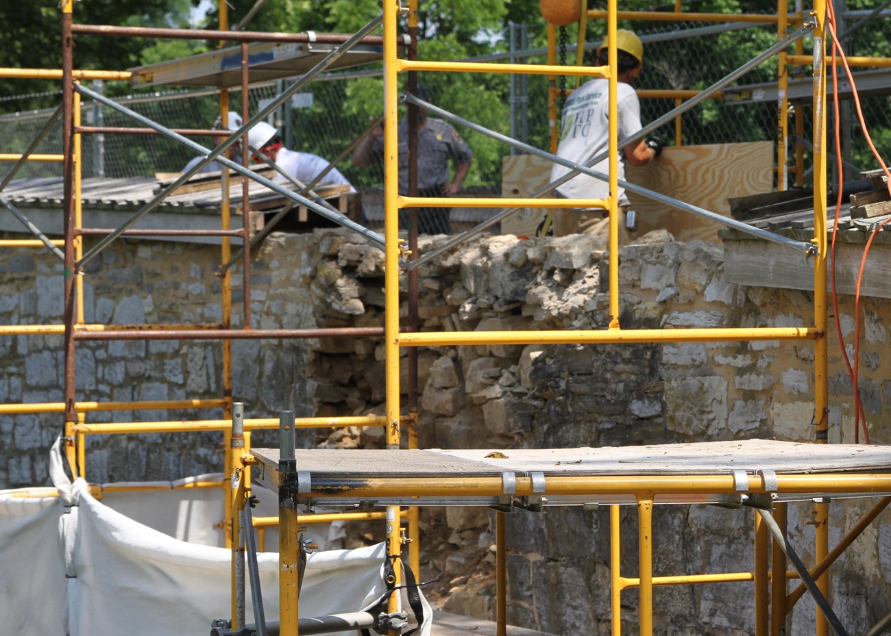 Workers make bridge repairs