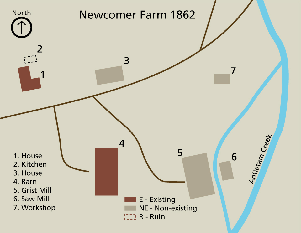 black and white photo of stone bridge and buildings