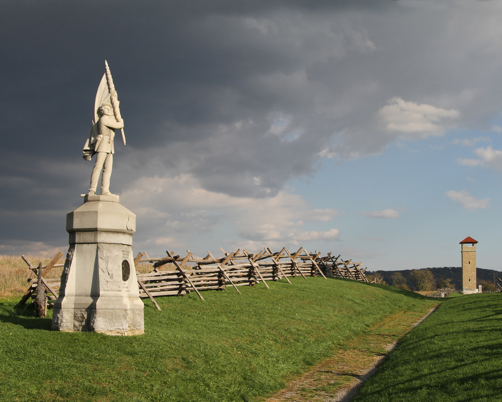 Dark clouds move in over Bloody Lane at Antietam with the 132nd Pennsylvania Infantry monument in the foreground.