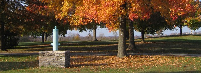 The West Woods at Antietam and a monument to Confederate Gen. William Starke who was killed during the battle.