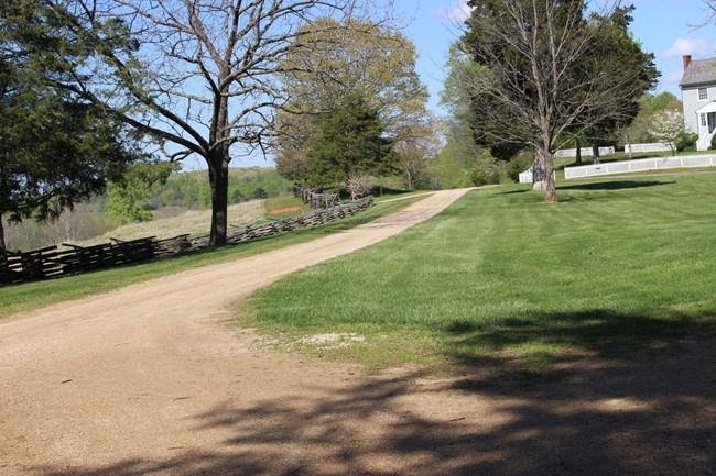 Dirt road going through the village. On the right is the Peers House and on the left are rolling hills on which Grant met withe Lee a second time.