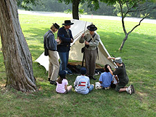 Day campers learn about soldiers' life during the Civil War. Day campers learn about soldiers' life during the Civil War.