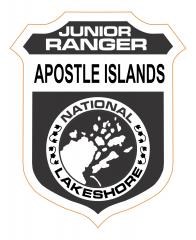 Photo of the junior ranger badge with a picture of the 22 islands.