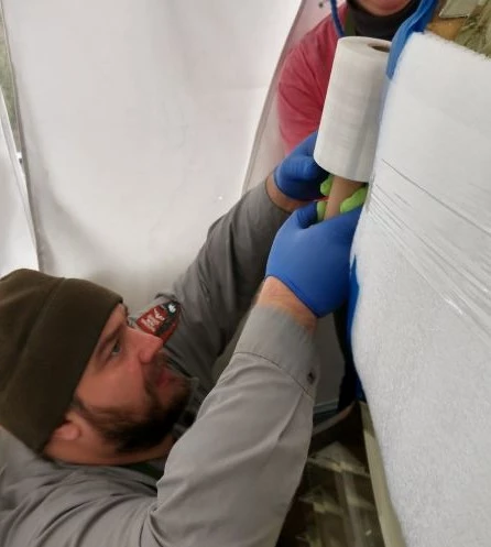 Devils lens emergency stabilization 2019_1028_resize Male wrapping padding around fresnel lens