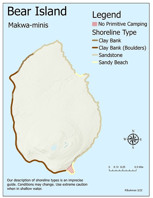 A map of Bear Island showing trails, shoreline, topography, and primitive camping zones.