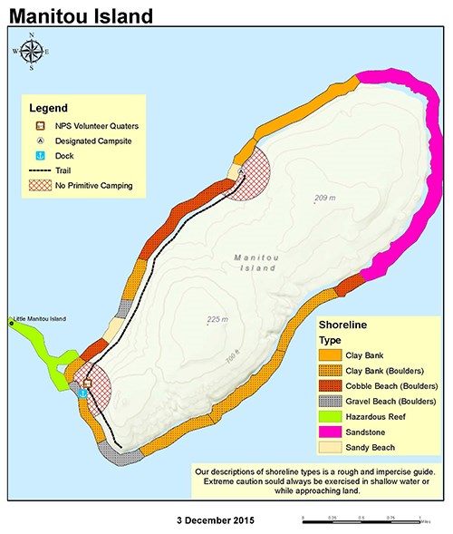 A map of Manitou Island showing trails, shoreline, topography, and primitive camping zones.