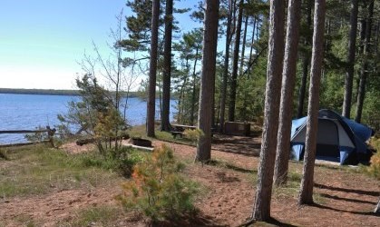Tent among the red pines at campsite eleven on Stockton Island, overlooking Lake Superior.