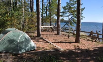 Two small tents looking out towards Lake Superior at campsite thirteen on Stockton Island.