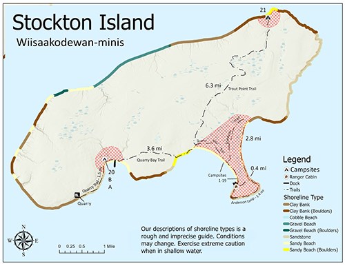 A map of Stockton Island showing trails, shoreline, topography, and primitive camping zones.