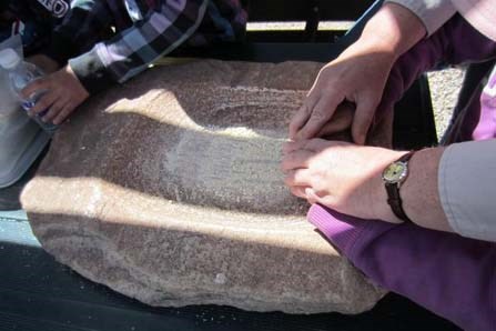 Using a mano and metate