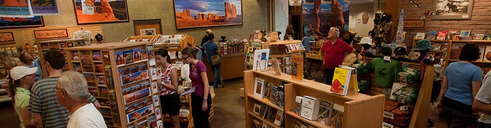 bookshelves with people looking at books