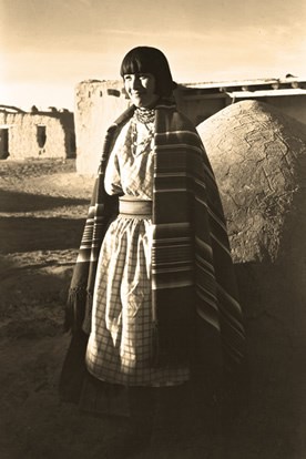 Young woman by horno, Ancelita Arquero, Cochiti Pueblo, New Mexico, 1925-1945. Photo by T. Harmon Parkhurst. Courtesy Palace of the Governors Photo Archives (NMHM/DCA. Neg. # 002491)