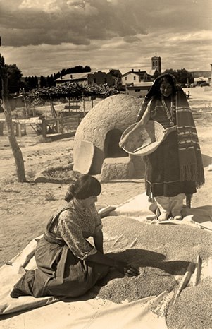 Women Winnowing Wheat, San Juan Pueblo, New Mexico,1925-1945. Photo by T. Harmon Parkhurst. Courtesy Palace of the Governors Photo Archives (NMHM/DCA Neg. # 003966)