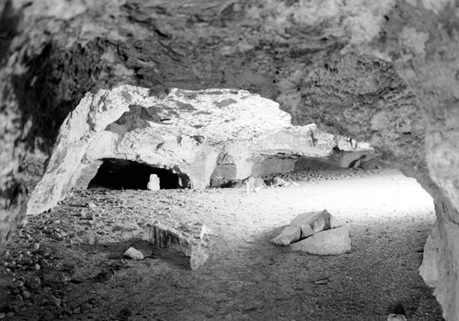Historic photograph of the interior of Rampart Cave.