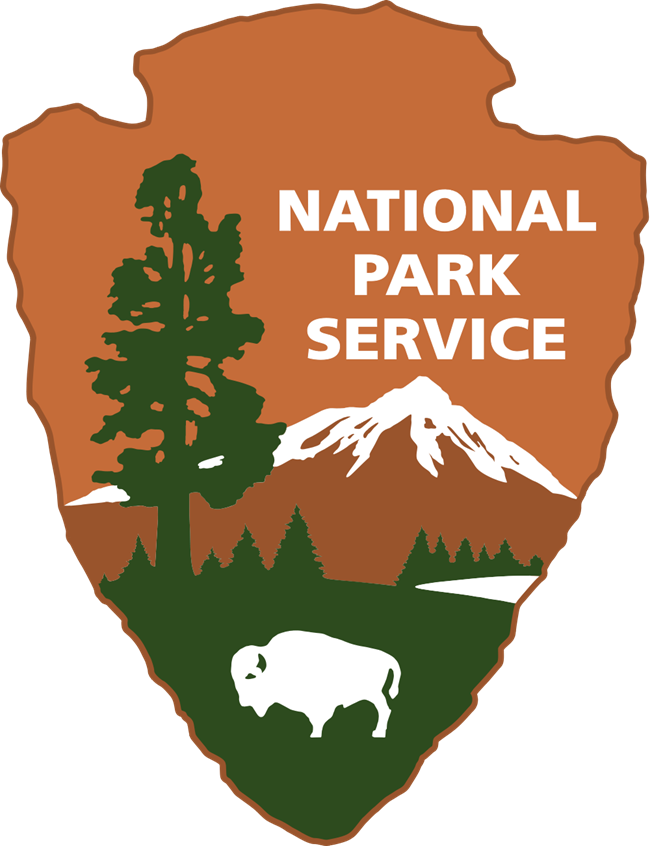 Official emblem of the National Park Service An arrowhead with a white bison, snow-capped mountain, and giant sequoia tree