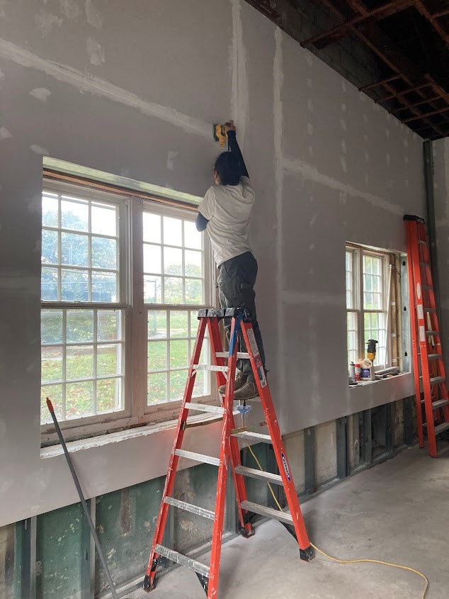 Sanding the Classroom Walls Sanding the Classroom Walls