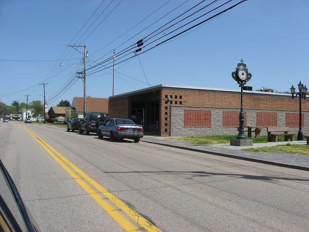 New Matamoras Post Office Street running in front of the brown masonry New Matamoras Post Office