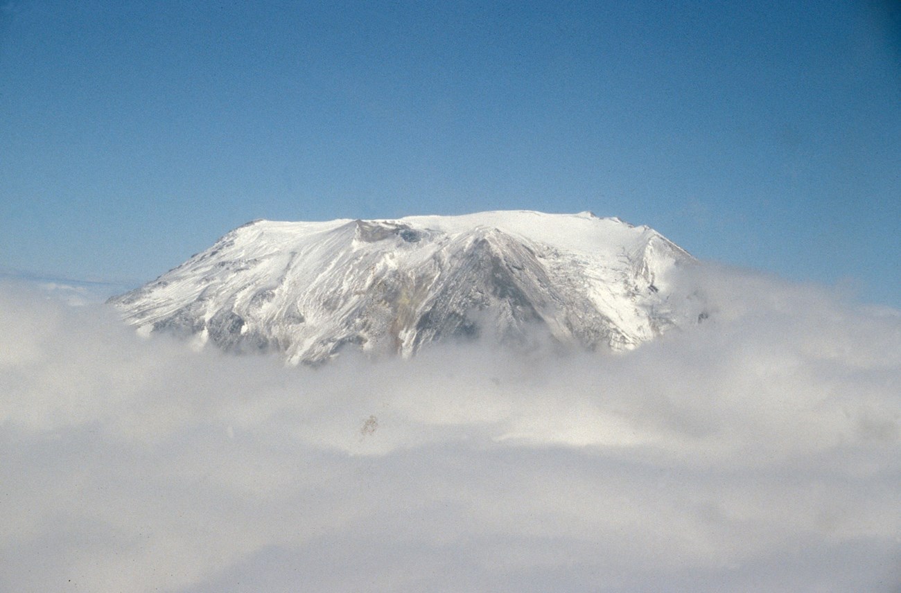 1123888689_41_3 flat topped volcanic peak covered with snow and ice