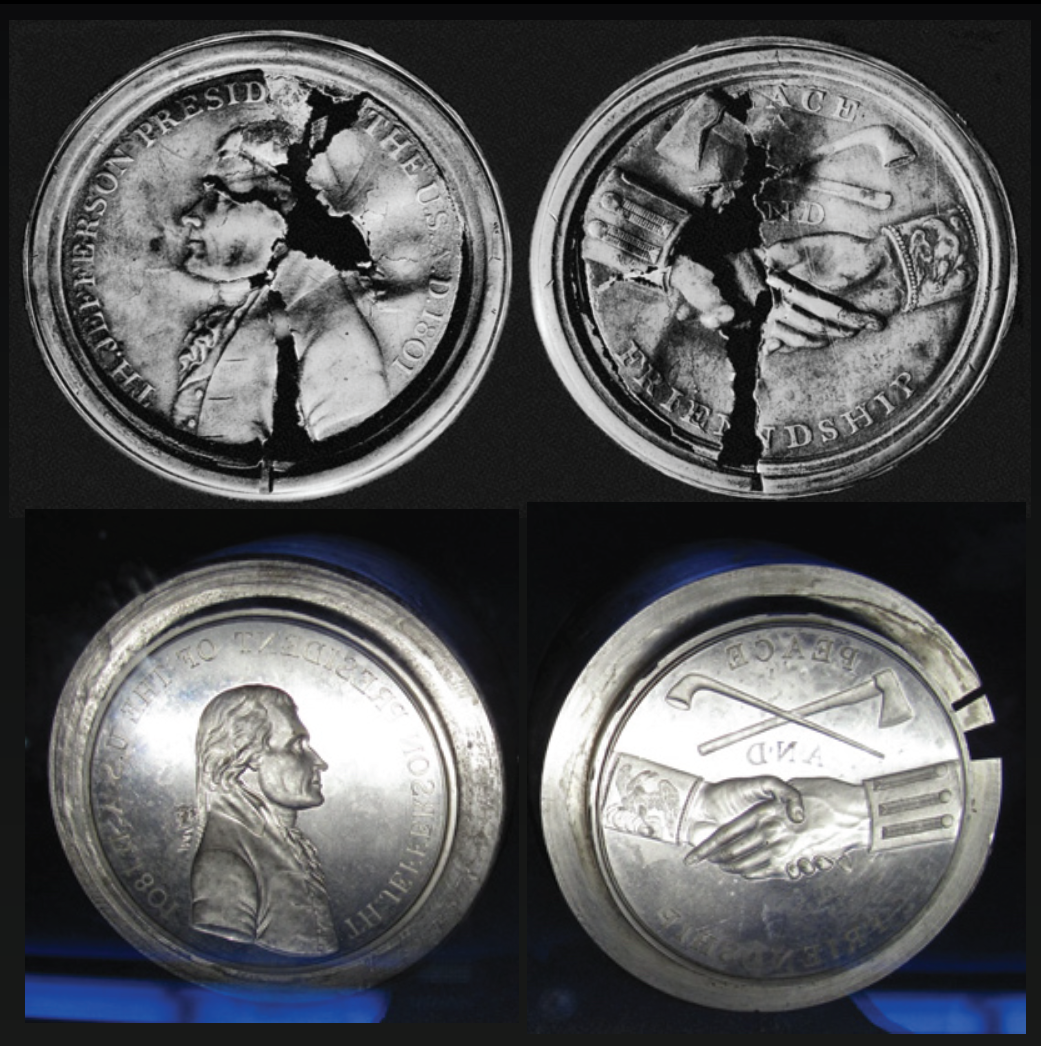 The fronts and backs of two silver peace medals. One deteriorated and one in good condition. The deteriorated metal front has an image of Thomas Jefferson with “Th. Jefferson President of the U.S.  A.D. 1801” in an arch around Jefferson’s silhouette .  Th