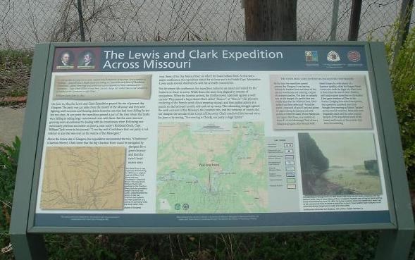 1234 A wayside historical marker overlooking the Missouri River, with the title, “The Lewis and Clark Expedition Across Missouri.” On the marker are two maps – one of the Expedition’s route across the state and a second showing the area around Glasgow, Missou