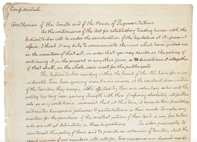 The top half of page one of Thomas Jefferson’s handwritten letter to Congress.  Faded brown ink on yellowed paper.
