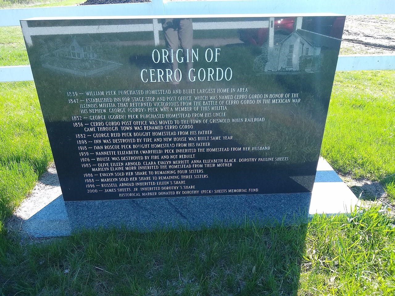 Cerro Gordo Marker Dark stone marker describing the origin of the town of Cerro Gordo