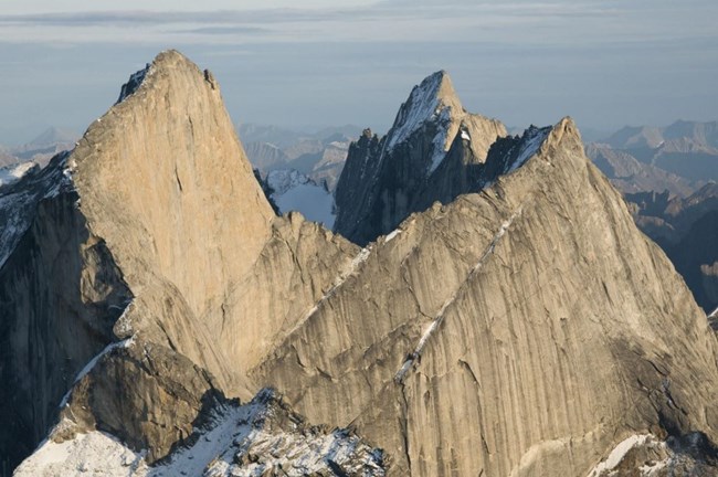 Rugged mountain top peaks with snow