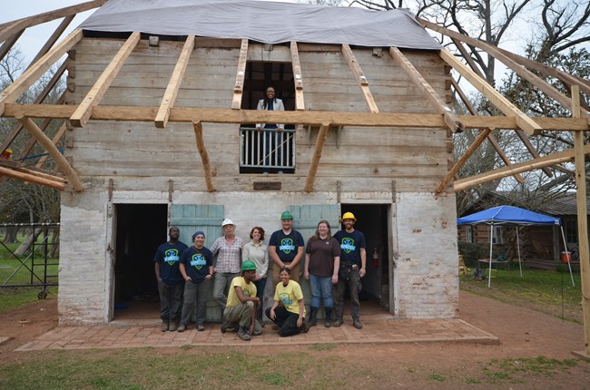 The HOPE Crew team pauses for a photo after completing the major framing work. The HOPE Crew team pauses for a photo after completing the major framing work.