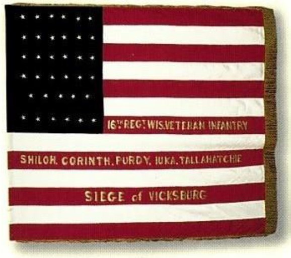 American flag with gold text on red stripes
