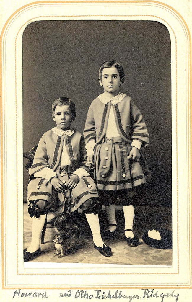 Howard Ridgely A historic black and white image of two young children.