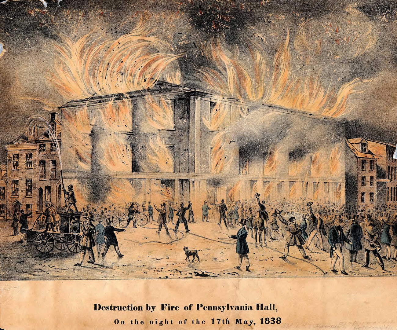Illustration by John Caspar Wild, a Swiss-born artist and lithographer, who arrived in Philadelphia from Paris in 1832. Drawing of a crowd of people staring at a three-story building with flames shouting out of its 27 windows and doors and a fire hose being shot at buildings next door.
