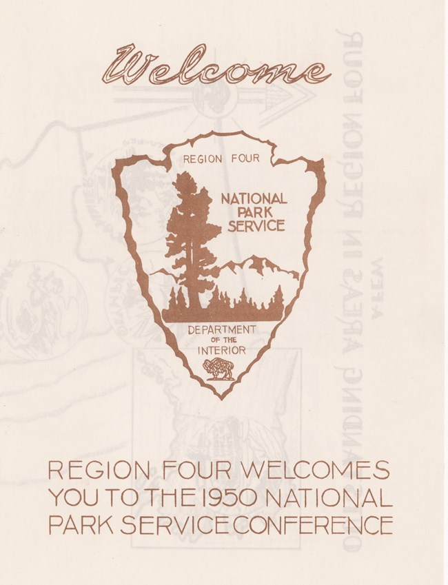1950 arrowhead Brown arrowhead with jagged trees and edges