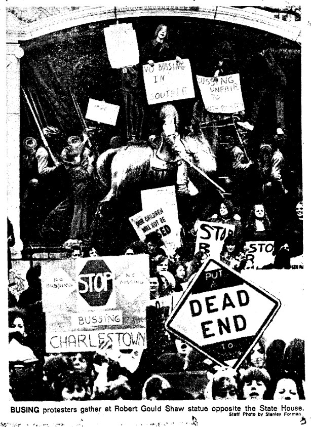 1973-RacialImbalanceAct Protestors climbing the Shaw 54th Regiment Memorial.