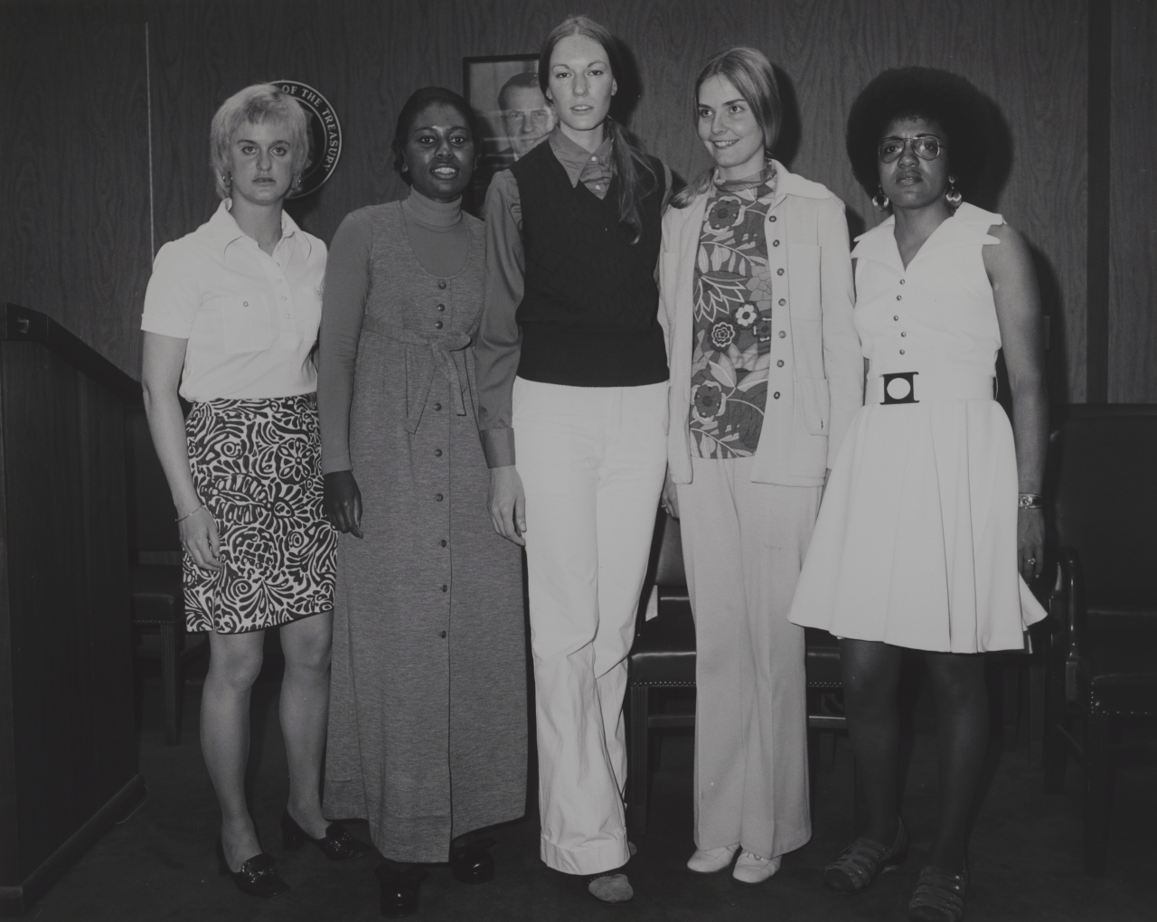 USPP women, 1974 Three white and two Black women wearing civilian clothes stand in a line posing for the photo.