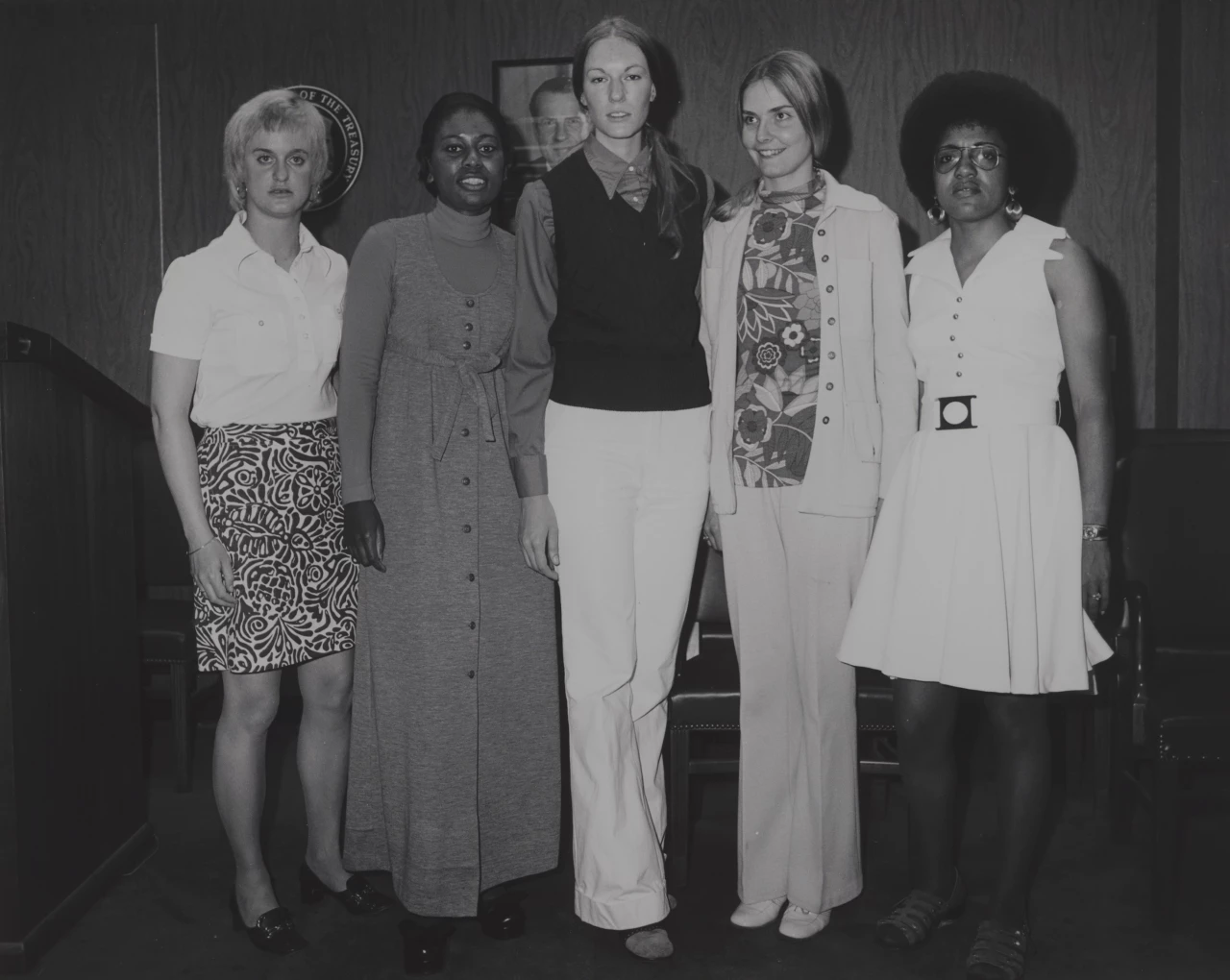 USPP women, 1974 Three white and two Black women wearing civilian clothes stand in a line posing for the photo.