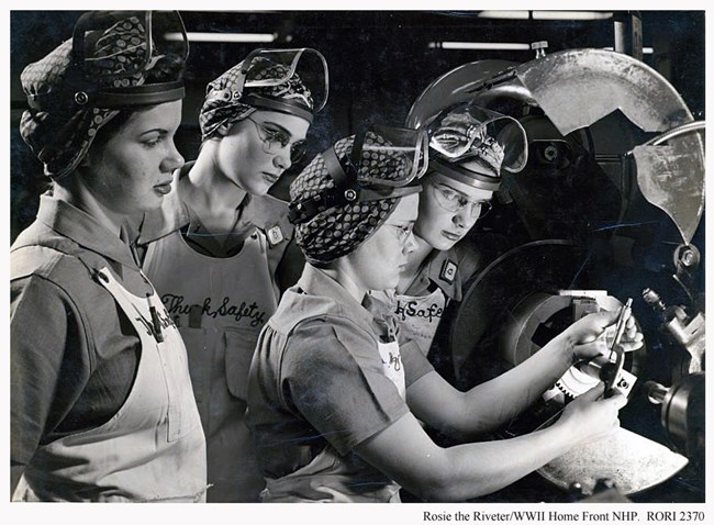 Four women with safety gear training during a work day.