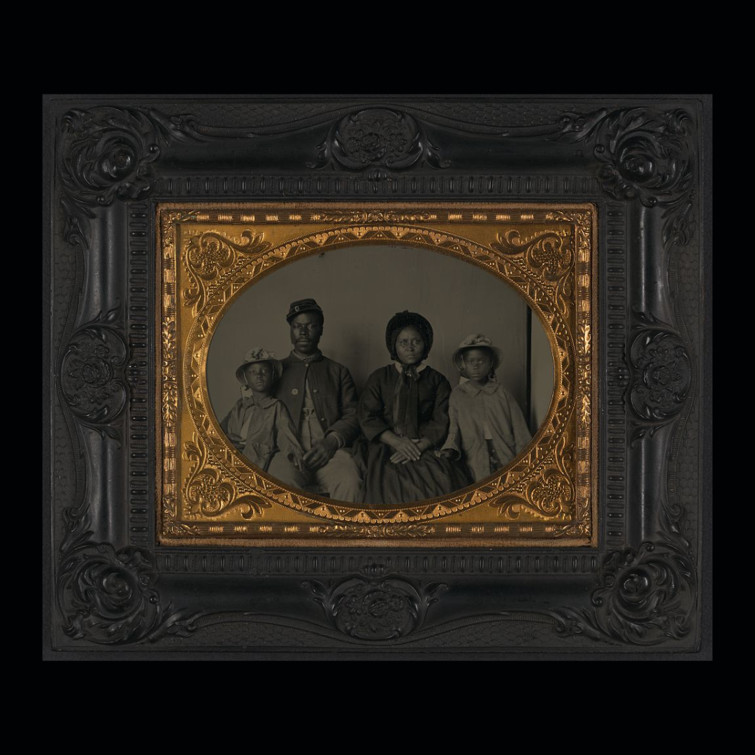USCT Soldier Takeover the Network A photograph of an unnamed USCT soldier with his wife and two daughters.